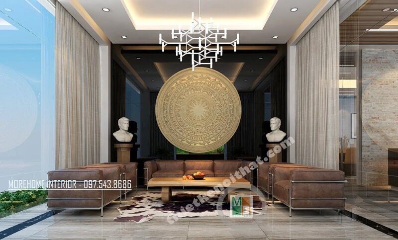 Trang trí nôi thất phòng tiếp khách văn phòng sang trọng sửu dụng đá tự nhiên ốp tường, bộ sofa da cao cấp, đèn trang trí,.. với tông màu nâu trầm chủ đạo